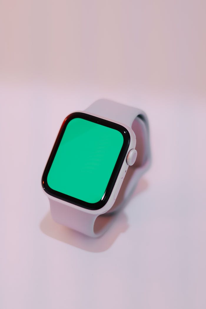 A sleek smartwatch featuring a blank green screen, perfect for technology themes.